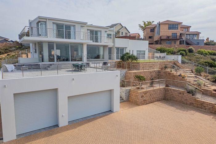 For Sale: Hartenbos Heuwels House with sea views, dream garages, and solar features.