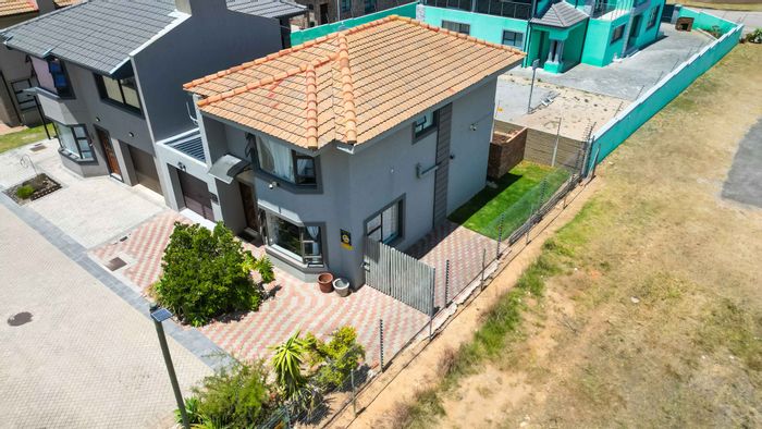 For Sale: Townhouse in Dana Bay with secure estate, garden, and garage.