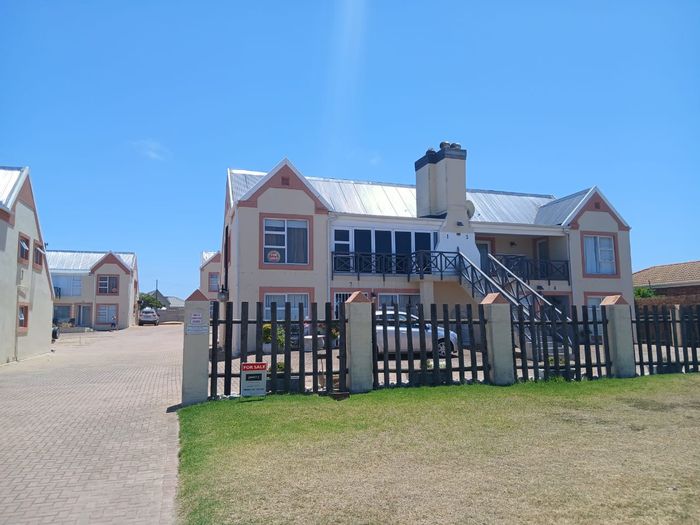 Gouritsmond Central Apartment For Sale: 2-bed, sea views, near beach and amenities.