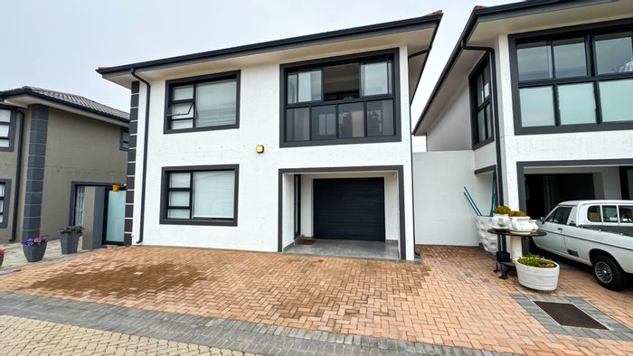 For Sale: Townhouse in Dana Bay with 3 en-suite bedrooms, automated garage, secure living.
