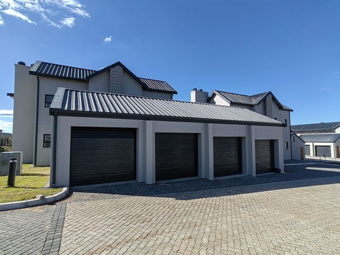 2-Bedroom Apartment in Hartland Lifestyle Estate For Sale with garage and patio.