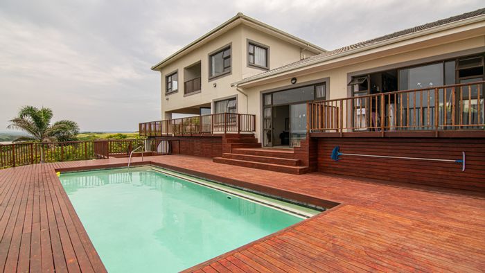 For Sale: House in Tugela Mouth with 6 bedrooms, pool, and river access.