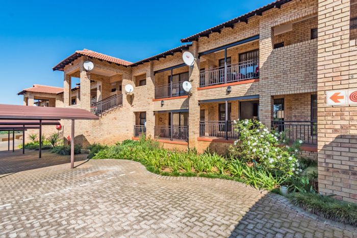 For Sale: 2-bedroom apartment in Monument with tenant, carport, and open plan living.