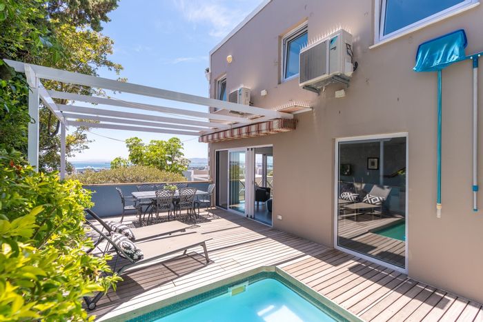 De Waterkant Townhouse To Rent: 3 bedrooms, pool, outdoor decks, secure complex.