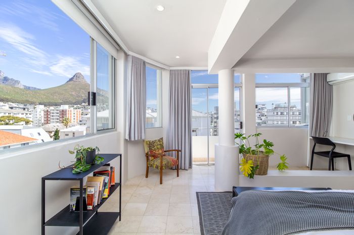 Sea Point Penthouse For Sale: Ocean views, wrap-around terrace, and secure parking.
