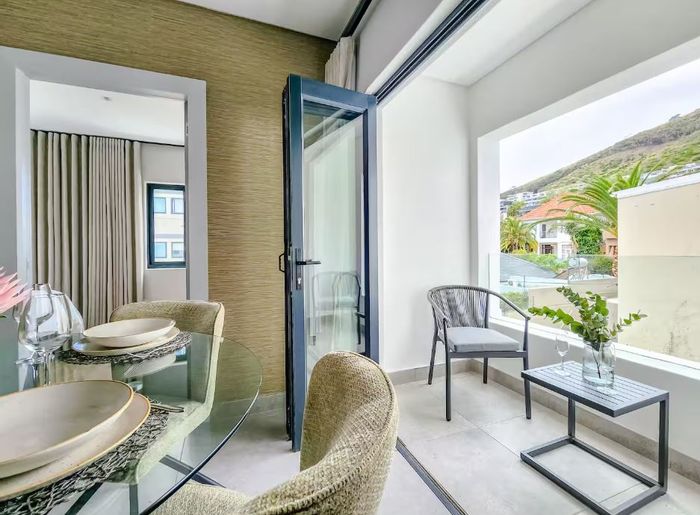 For Sale: Sea Point Apartment with 2 beds, parking, and Atlantic Seaboard views.