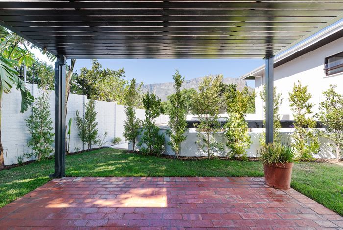 Tamboerskloof Apartment For Sale: Two bedrooms, private garden, secure parking, extendable space.