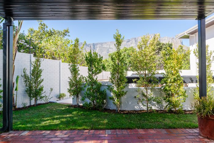 Tamboerskloof Townhouse For Sale: Exclusive unit, private garden, views, parking included.