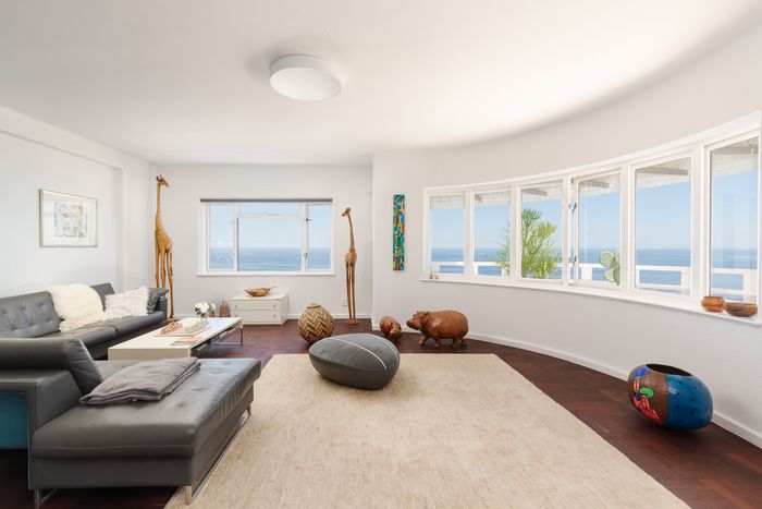 Sea Point Apartment For Sale: Ocean views, wraparound balcony, double garage, concierge.