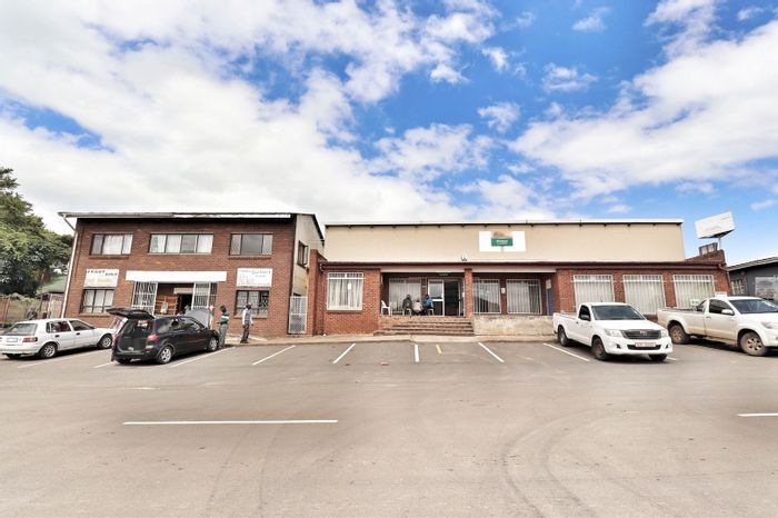 Office for Sale in Melmoth Central: Multiple offices, parking, and additional rental units.