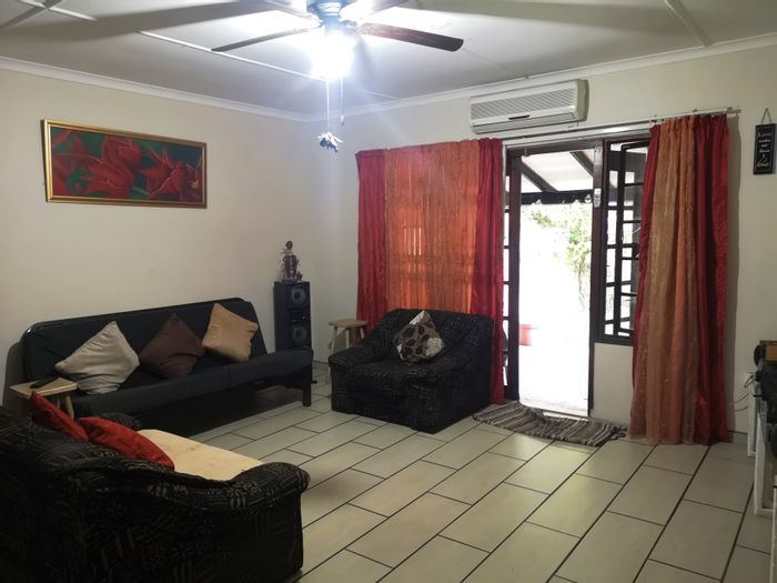 To Rent: 2-Bedroom Townhouse in Arboretum with garden, double garages, and secure complex.