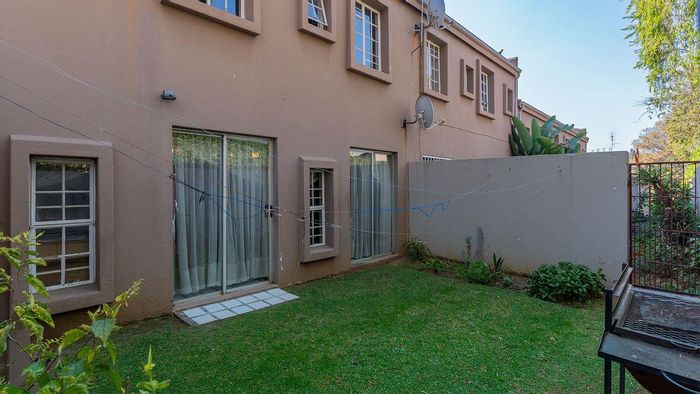 For Sale: Townhouse in Corlett Gardens with private garden and secure parking.