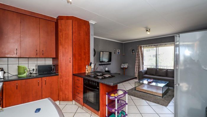 Croydon Apartment For Sale: 2 beds, 2 baths, garage, secure complex amenities.