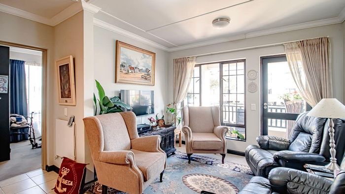 Rietvalleirand Apartment For Sale: One-bedroom with balcony, community care, and amenities.