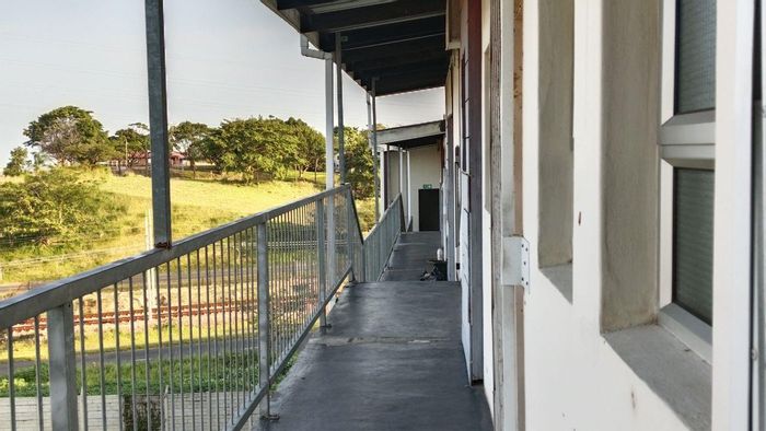 For Sale: 2-bedroom apartment in Woodhurst with balcony and gated complex amenities.