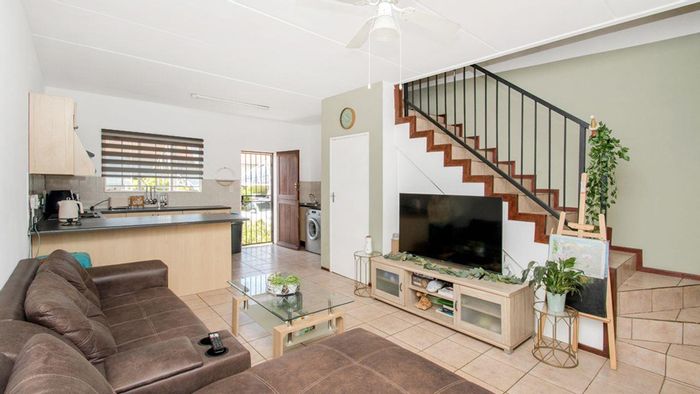For Sale: Duplex Townhouse in Noordhang with private garden and communal pool.