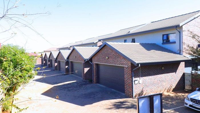 For Sale: 3-Bedroom Townhouse in Doornpoort with security, garage, and garden.