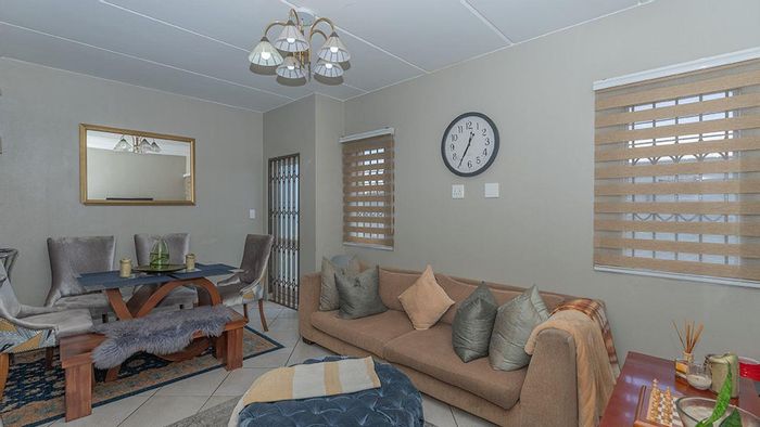 For Sale: Townhouse in Albertsdal with 3 beds, private garden, and security.