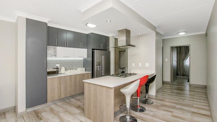 For Sale: Carlswald Townhouse with garden, clubhouse, pool, and 24/7 security.
