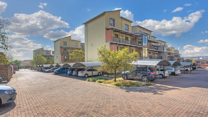 Carlswald Apartment For Sale: 2 beds, 2 baths, open-plan living, covered carport.
