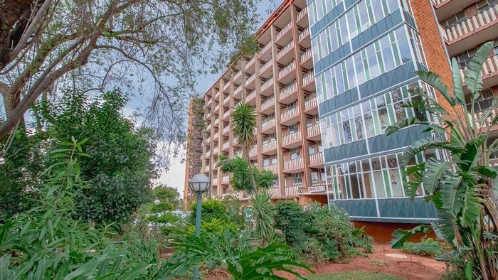 For Sale: Weavind Park Apartment with 2 bedrooms, garage, and scenic views.