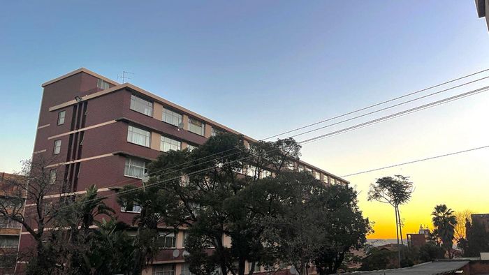 For Sale: Apartment in Wonderboom South with garage, communal garden, and security.