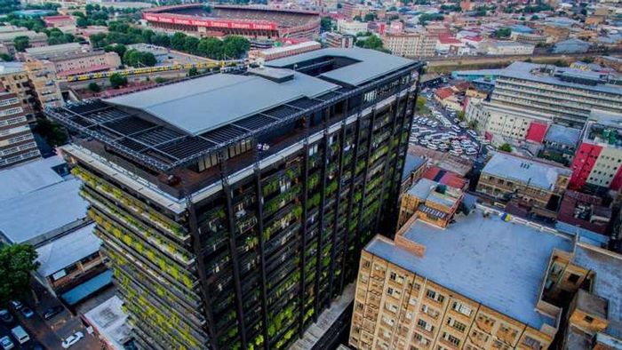 For Sale: Apartment in New Doornfontein with rooftop restaurant, security, and rental potential.