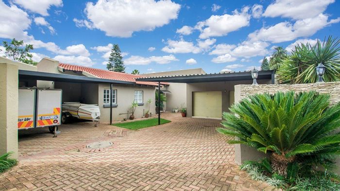For Sale: House in Strubensvallei with 4 bedrooms, double garage, and security.