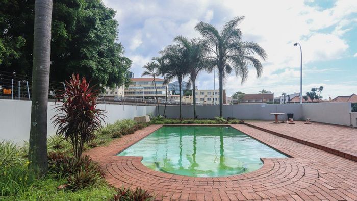 2-Bedroom Apartment in Bulwer For Sale: Secure complex, pool access, convenient location.