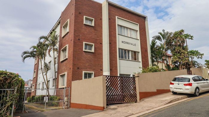 For Sale: Glenwood Apartment with secure complex, spacious lounge, and rental income.