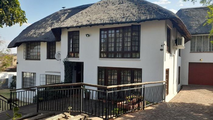 For Sale: House in Ridgeway with 4 bedrooms, entertainment room, koi pond, and courtyard.