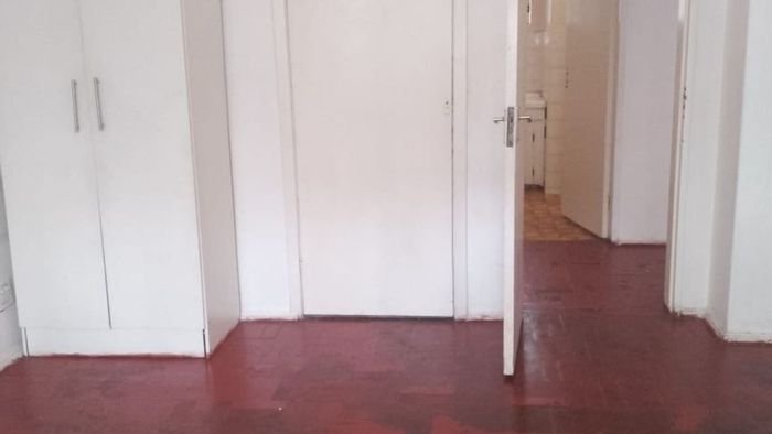 2-Bedroom Apartment For Sale in Hillbrow with rental income and secure parking.