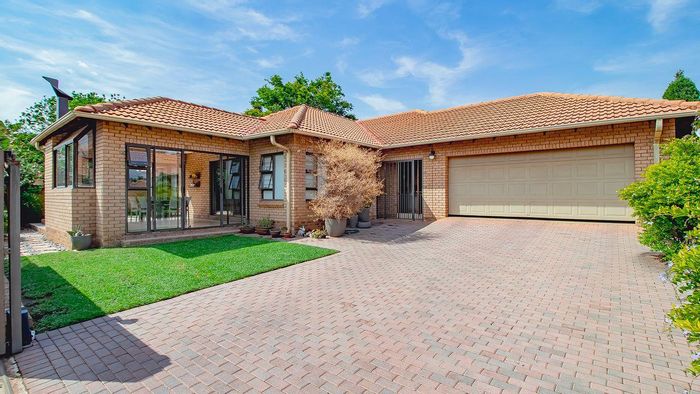 House for Sale in Equestria: Secure estate, open-plan living, enclosed patio, double garage.