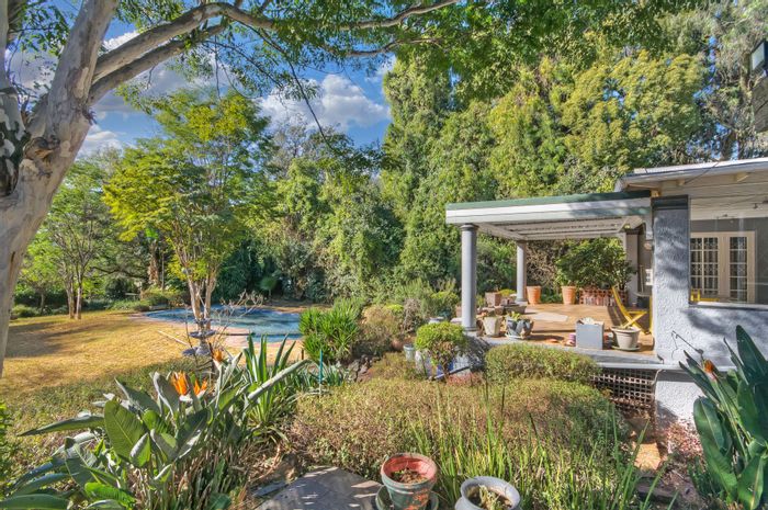 4-Bedroom House For Sale in Observatory with pool, dual garage, and spacious yard.