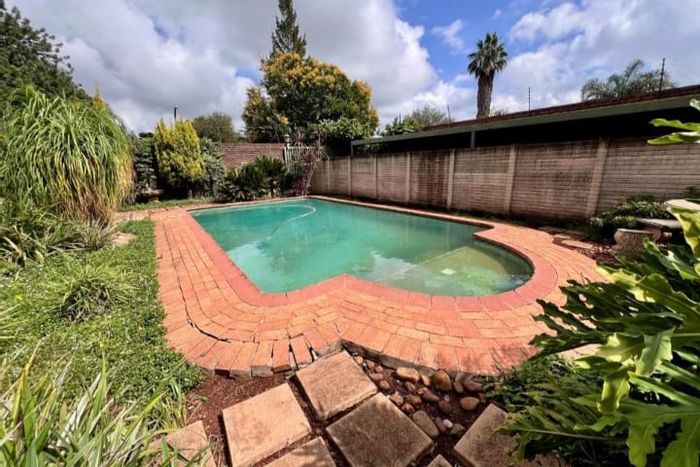 For Sale: Wierda Park House with 4 bedrooms, pool, study, and gym space.