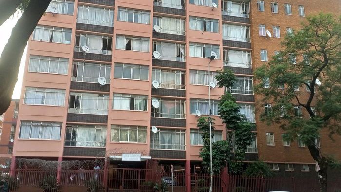 For Sale: Apartment in Pretoria Central with parking, biometric access, and close amenities.