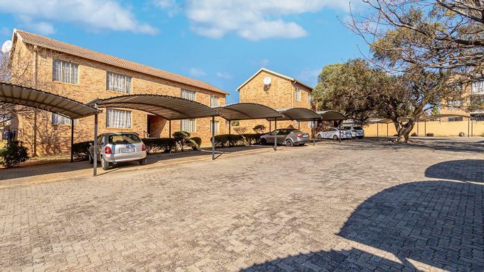 For Sale: 2-bedroom apartment in Northgate with parking and children's play area.
