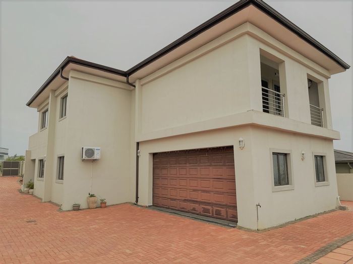 For Sale: House in Tongaat Beach with 3 bedrooms, sea views, and estate amenities.