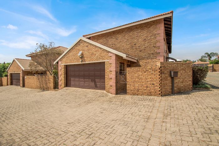 For Sale: Honeydew Manor Townhouse with 3 beds, garden, and automated garage.