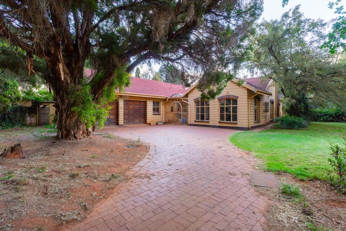 For Sale: Larrendale House with 4 beds, double garages, and spacious backyard.