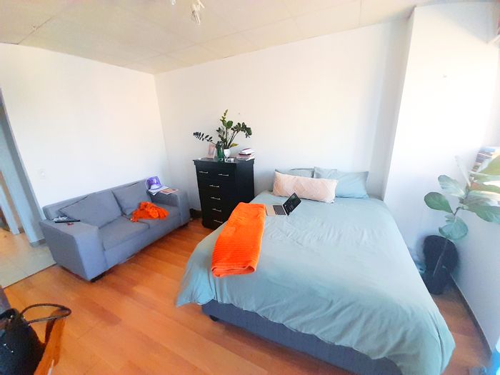 For Sale: Bachelor Apartment in Marshalltown with balcony, kitchen, and rental potential.