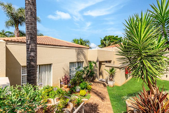 For Sale: Rangeview Townhouse with 2 bedrooms, private garden, and secure parking.