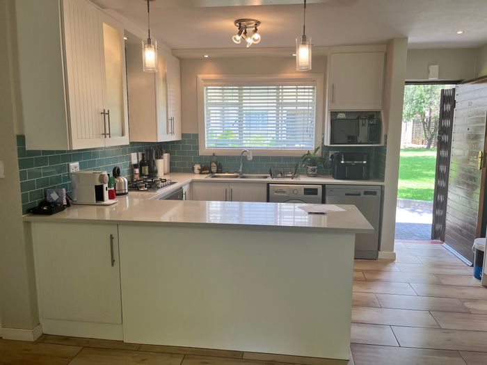 Ground-floor townhouse for sale in Eden Glen with private garden and amenities.