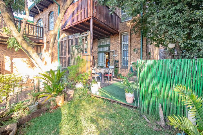 For Sale: Townhouse in Capital Park with garden, balcony, and three parking spaces.