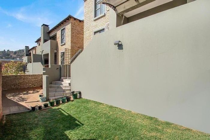 For Sale: 2-Bedroom Townhouse in Helderkruin with private garden and secure parking.