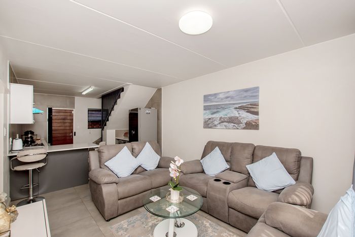 For Sale: House in Rand Collieries with garden, double garage, and security features.