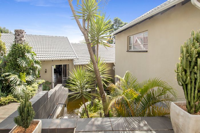 For Sale: Spacious Roodekrans house with pool, garden, and energy-efficient features.