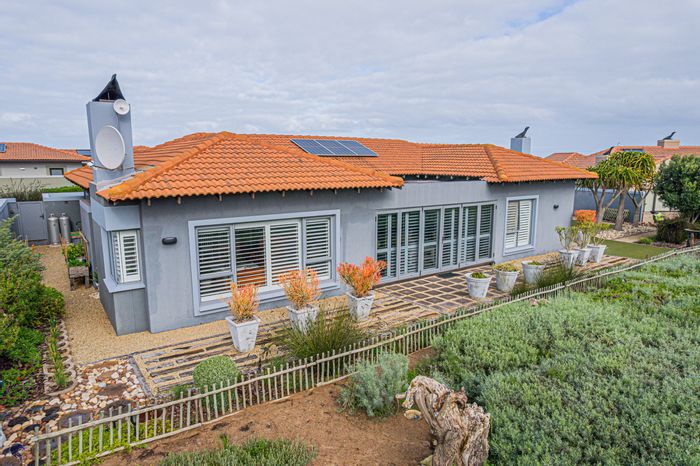 House for Sale in Langebaan Country Estate: 4 beds, flatlet, solar power, security.