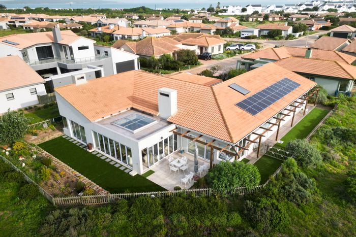 For Sale: House in Langebaan Country Estate with golf views, spacious living, and solar power.