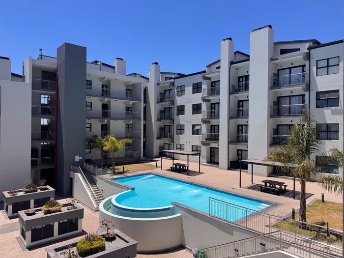 For Sale: Olifantskop Townhouse with lagoon views, pool access, and secure parking.